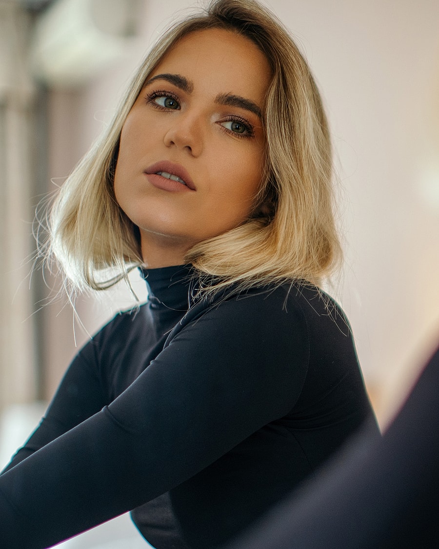 Portrait of a woman with blonde hair.