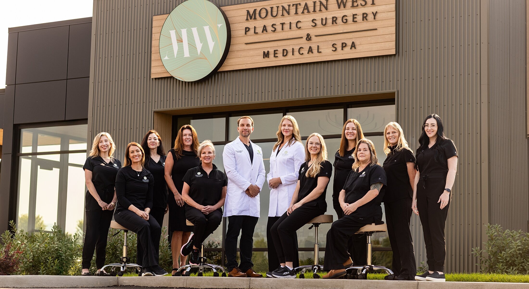 Team of professionals outside medical spa.