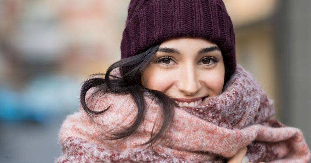 Woman with beautiful smile in winter clothing (model)